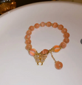 Gold Orange Crystal Glass Cat Eye